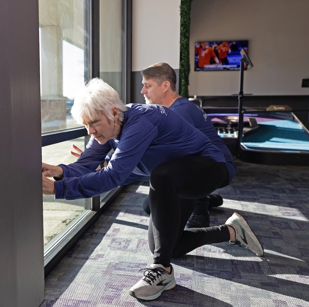 Team applying window film to commercial location in southwest Michigan.