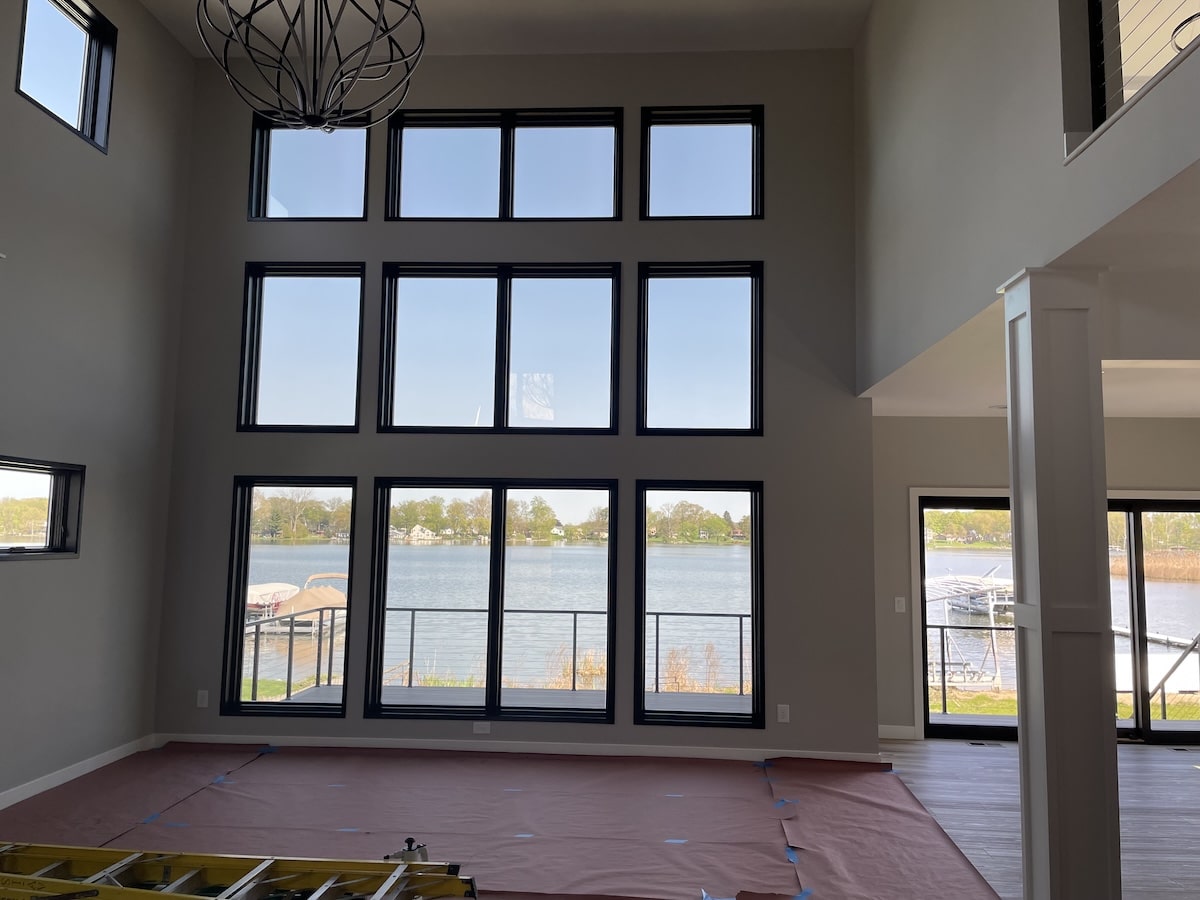 Reflective and private window film on new lake home in Michigan.