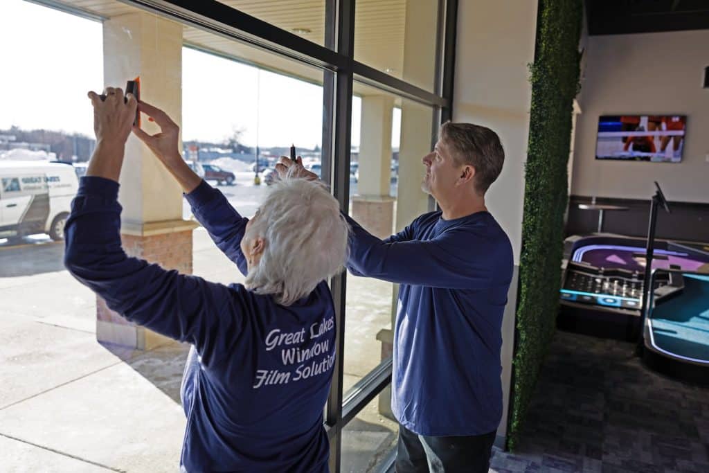 Audrey and Brandon installing film