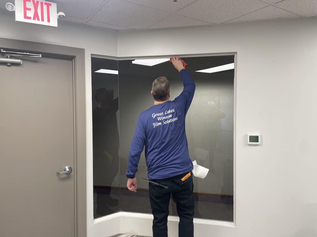 installing commercial office window film for privacy